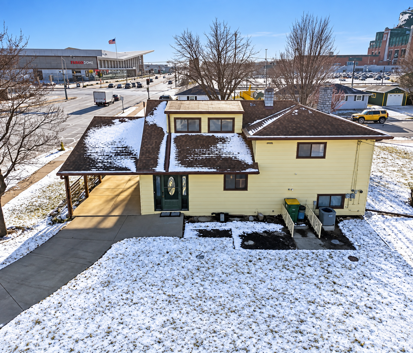 Aerial view of Green Bay Original with Lambeau Field beyond